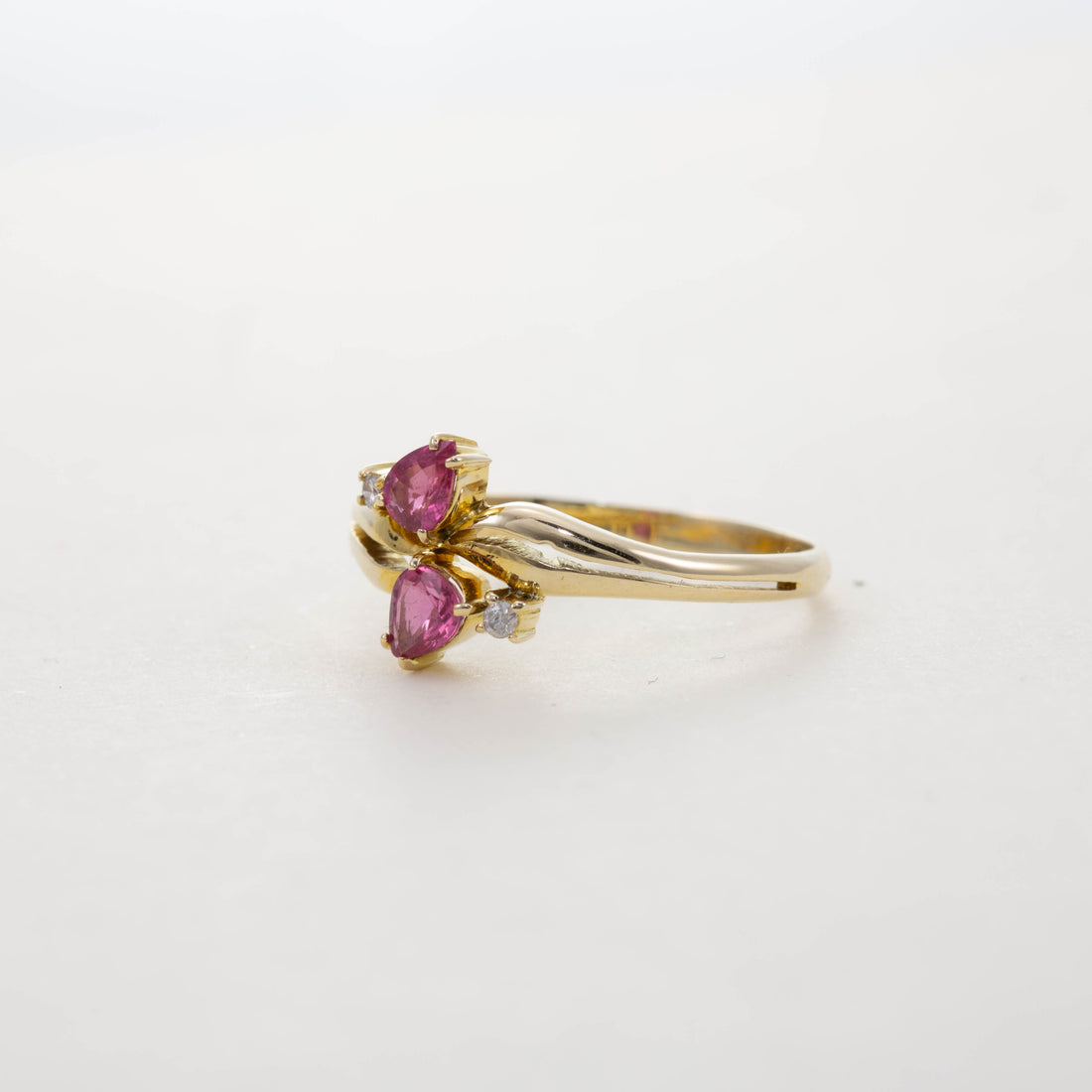 Pink sapphire & diamond twist ring