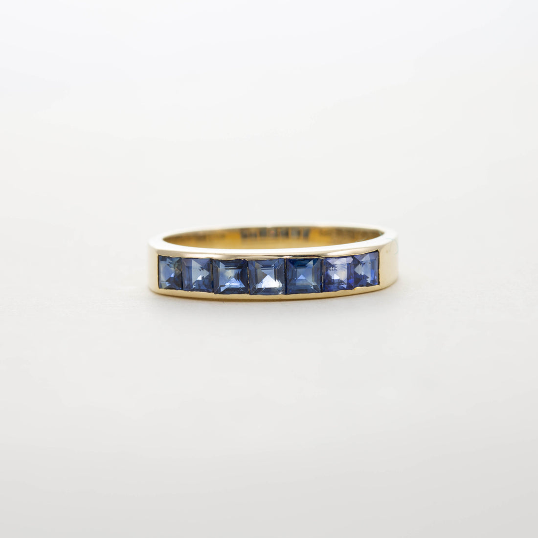 SQUARE CUT SAPPHIRE HALF ETERNITY RING