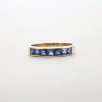 SQUARE CUT SAPPHIRE HALF ETERNITY RING