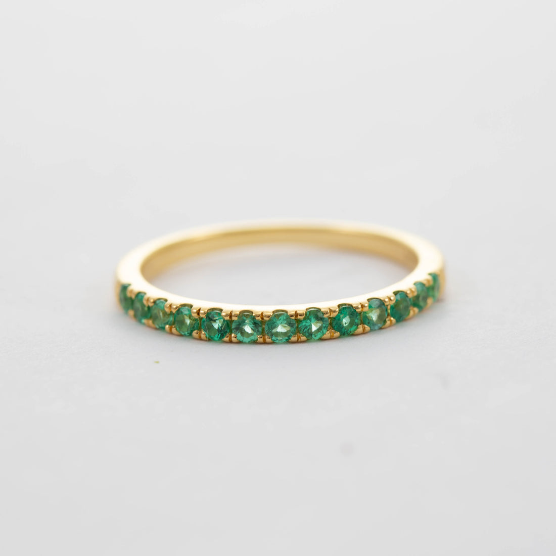 9CT YG 13 STONE EMERALD BAND