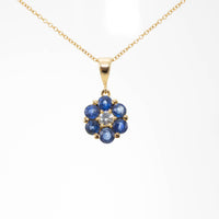 18CT YG SAPPHIRE & DIA DAISY CLUSTER PENDANT