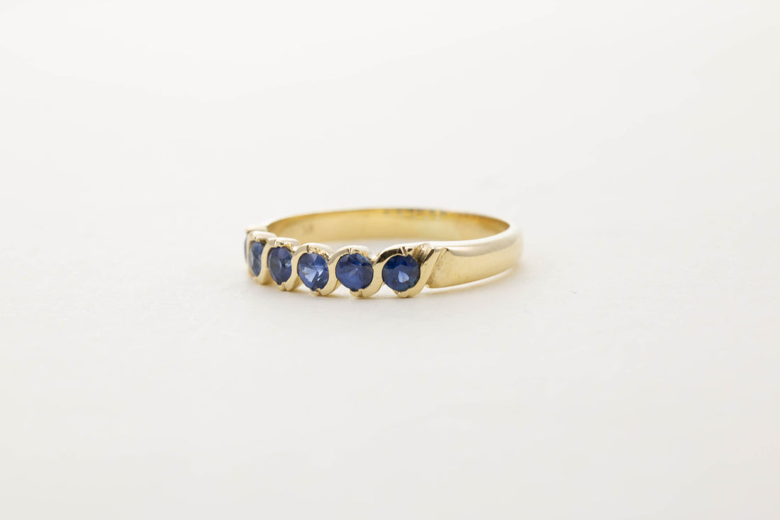 9CT YG SIX STONE SAPPHIRE TWIST HALF ETERNITY RING