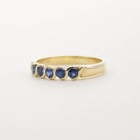 9CT YG SIX STONE SAPPHIRE TWIST HALF ETERNITY RING