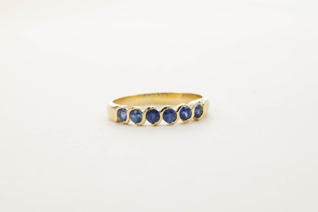 9CT YG SIX STONE SAPPHIRE TWIST HALF ETERNITY RING