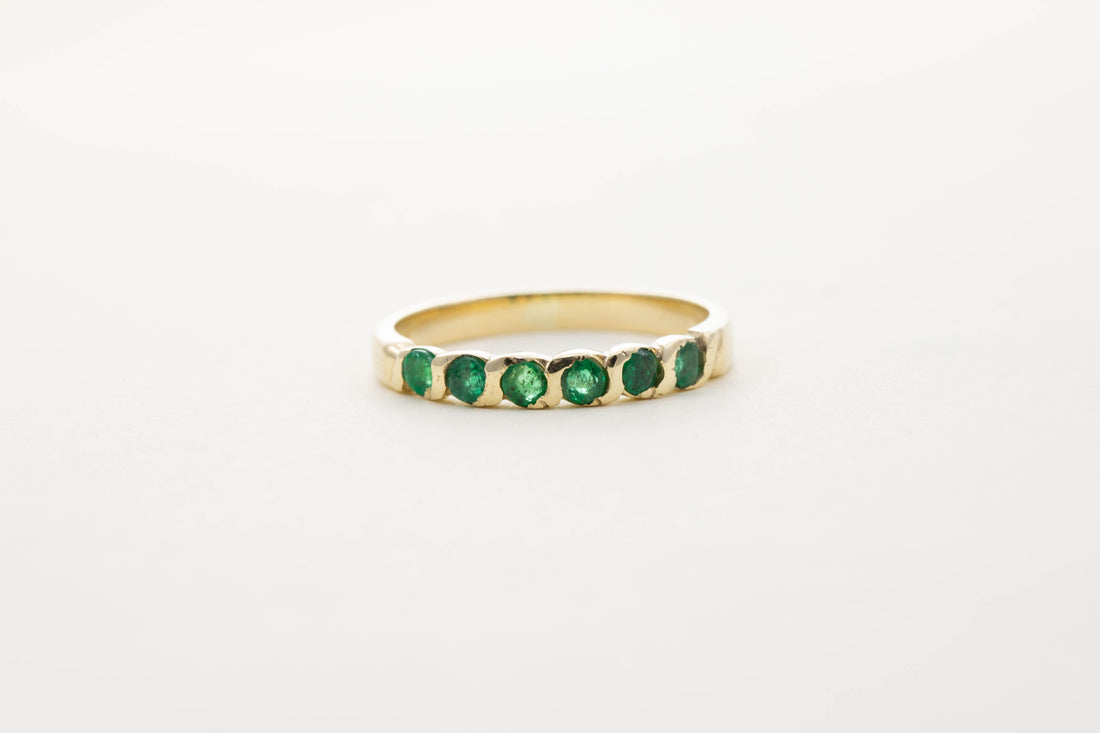 9CT YG SIX STONE EMERALD TWIST HALF ETERNITY RING