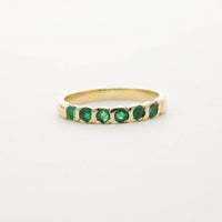 9CT YG SIX STONE EMERALD TWIST HALF ETERNITY RING