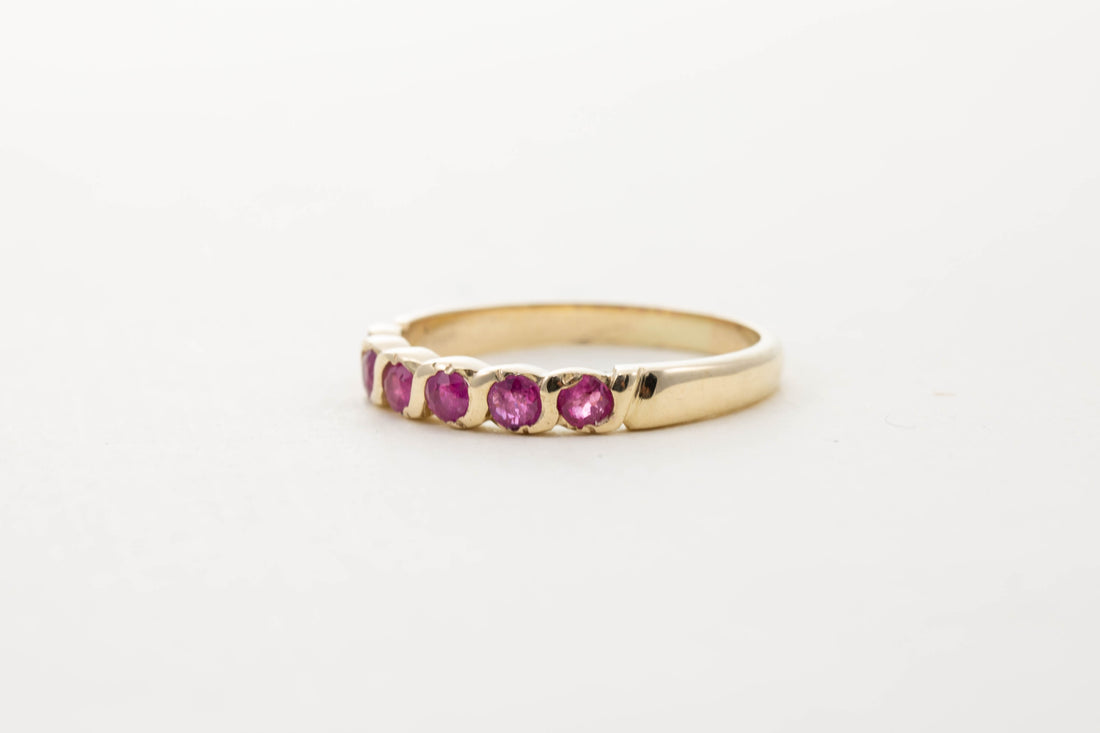 9CT YG SIX STONE RUBY TWIST HALF ETERNITY RING