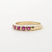 9CT YG SIX STONE RUBY TWIST HALF ETERNITY RING