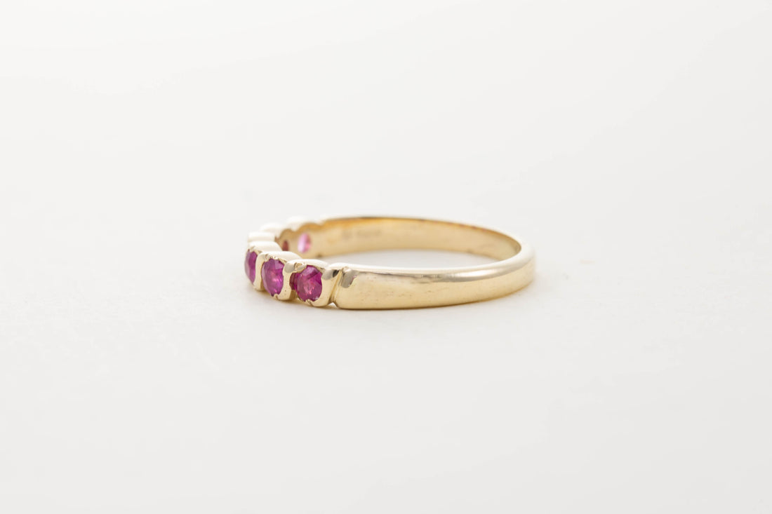 9CT YG SIX STONE RUBY TWIST HALF ETERNITY RING