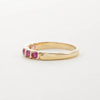 9CT YG SIX STONE RUBY TWIST HALF ETERNITY RING