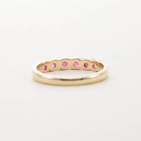 9CT YG SIX STONE RUBY TWIST HALF ETERNITY RING