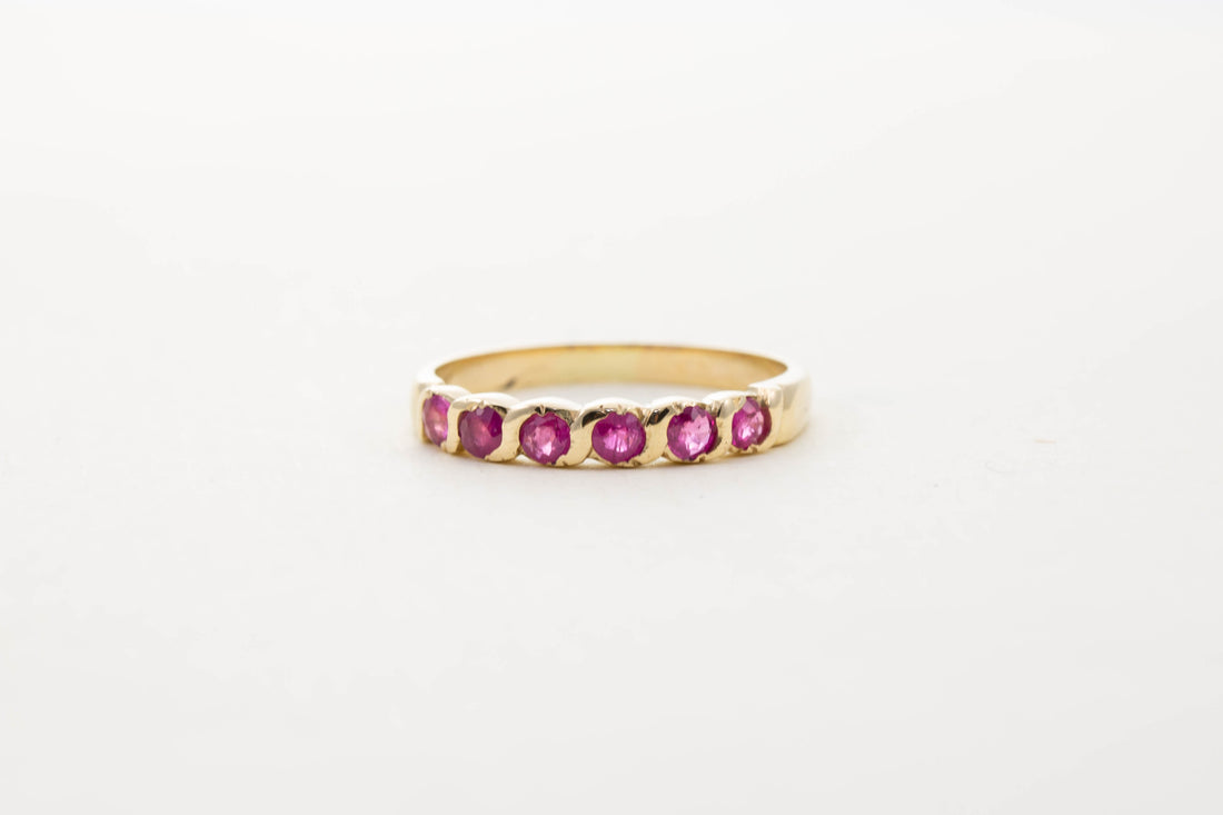 9CT YG SIX STONE RUBY TWIST HALF ETERNITY RING