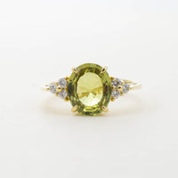 18CT YG CHRYSOBERYL WITH DIAMOND SHOULDERS