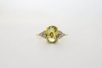 18CT YG CHRYSOBERYL WITH DIAMOND SHOULDERS