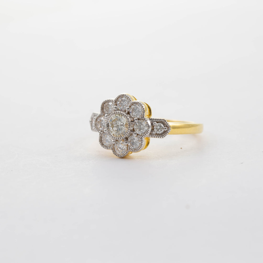 18CT YG DIAMOND DAISY CLUSTER RING