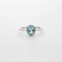 9CT WG MEDIUM OVAL AQUA SOLITAIRE RING 1.54ct