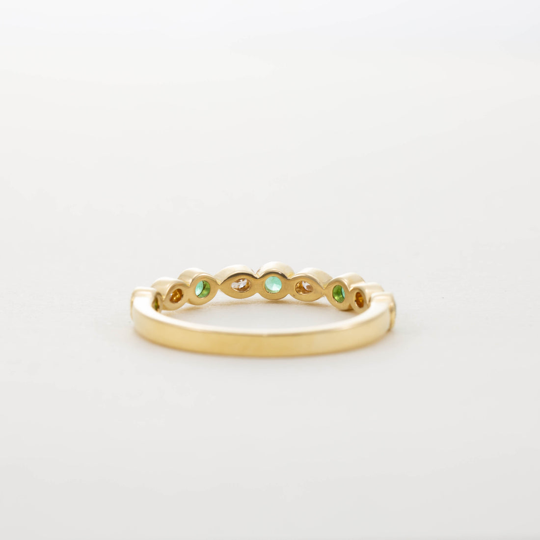 18CT YG EMERALD & PEAR DIAMOND HALF ETERNITY RING