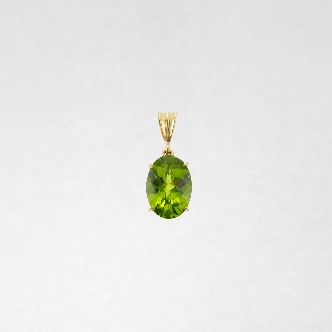 18ct YG Large chequerboard cut peridot pendant