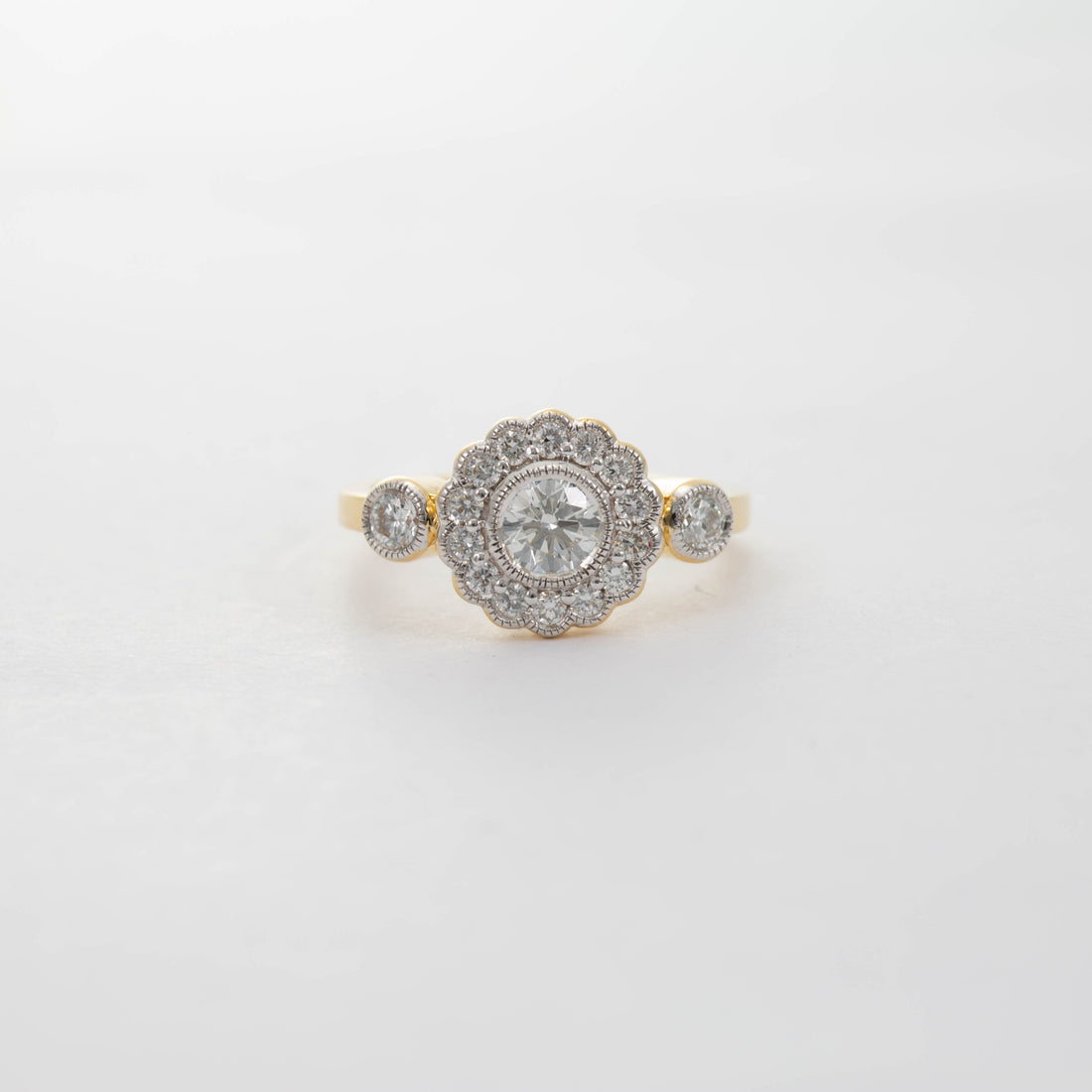 18CT YG DIAMOND DAISY CLUSTER WITH DIAMOND SHOULDERS