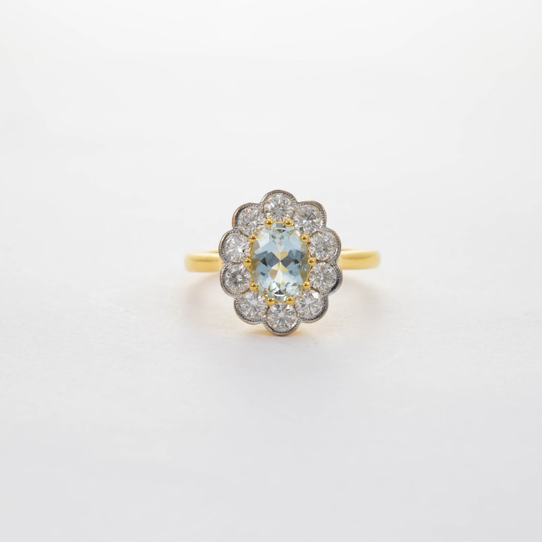 18CT YG AQUA & DIAMOND CLUSTER RING