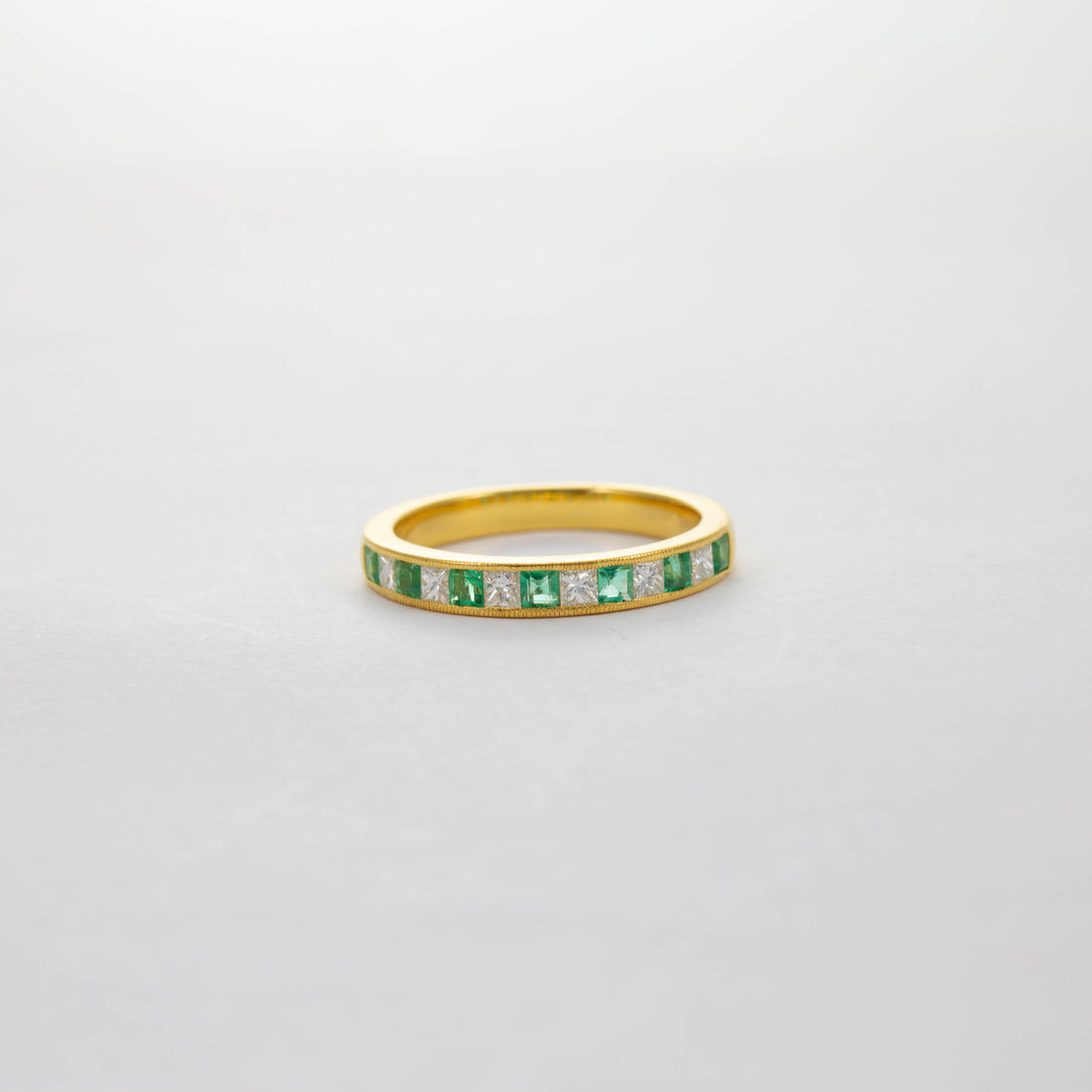 18CT YG EMERALD & DIAMOND HALF ETERNITY RING