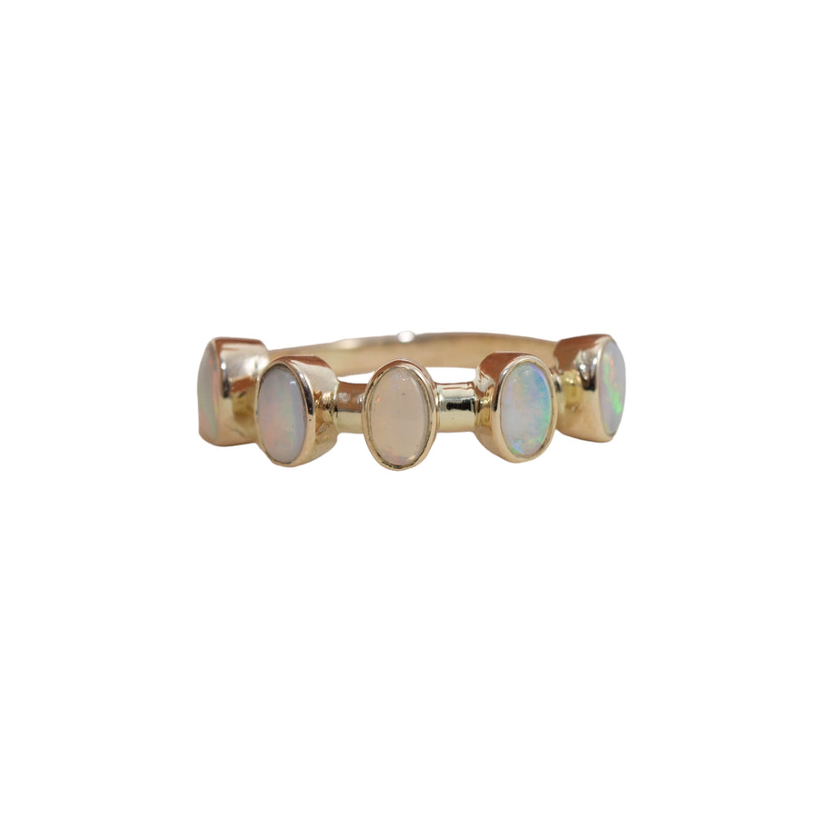 Solid opal five stone ring