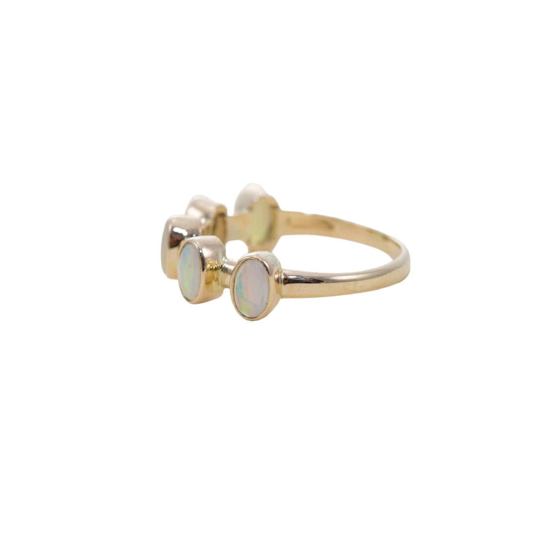 Solid opal five stone ring