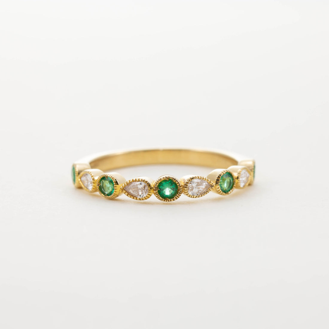 18CT YG EMERALD & PEAR DIAMOND HALF ETERNITY RING