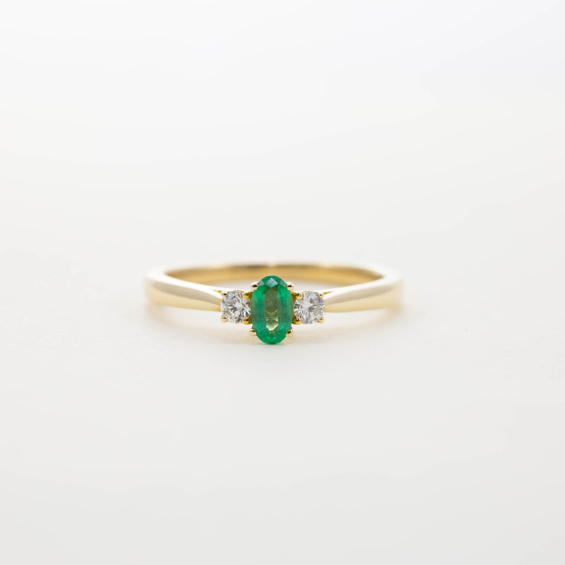 18ct YG Oval Emerald & Diamond Three Stone Ring