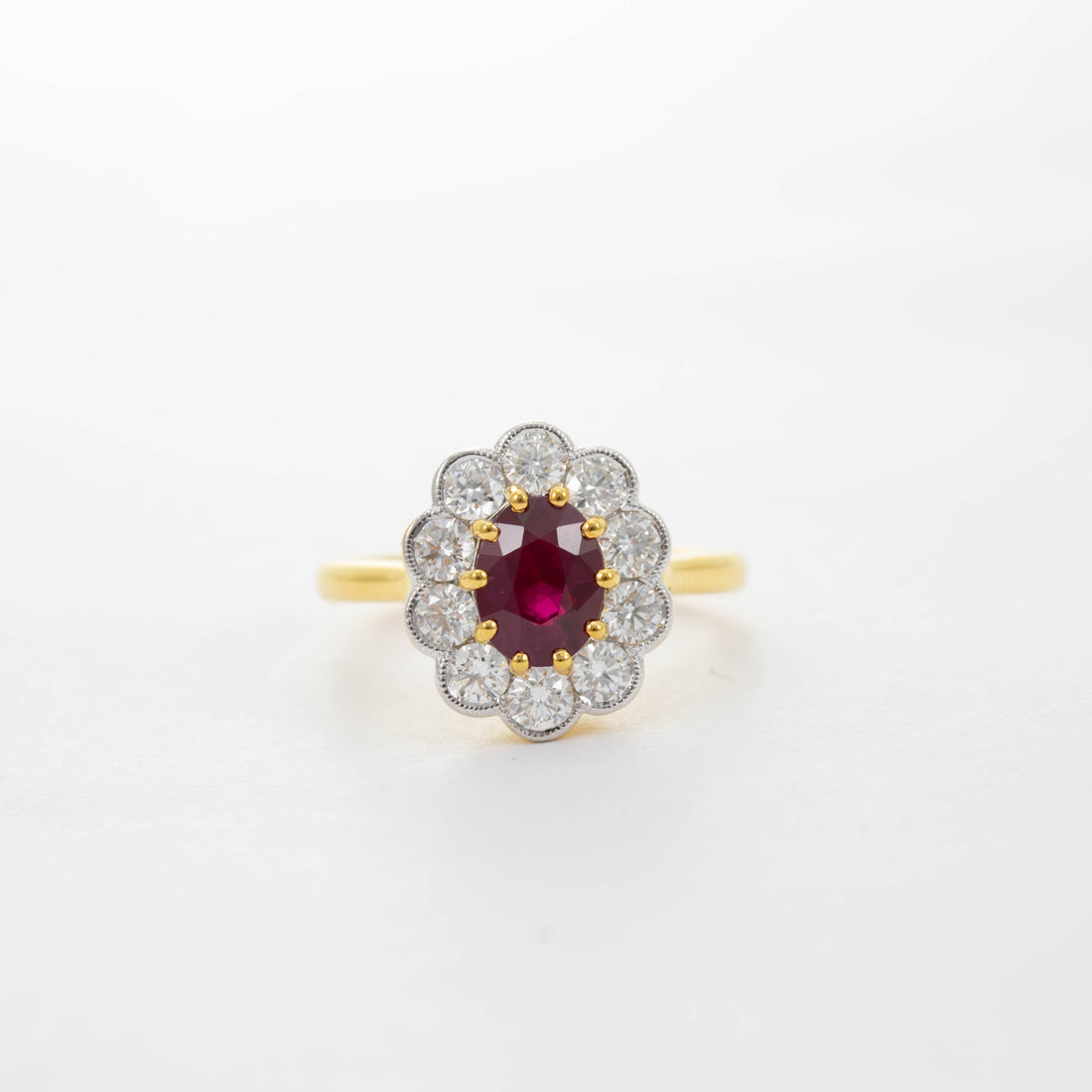 18CT YG RUBY & DIAMOND CLUSTER RING